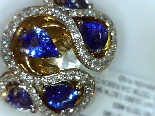 Precious Metal Gemstone Rings Over $5000