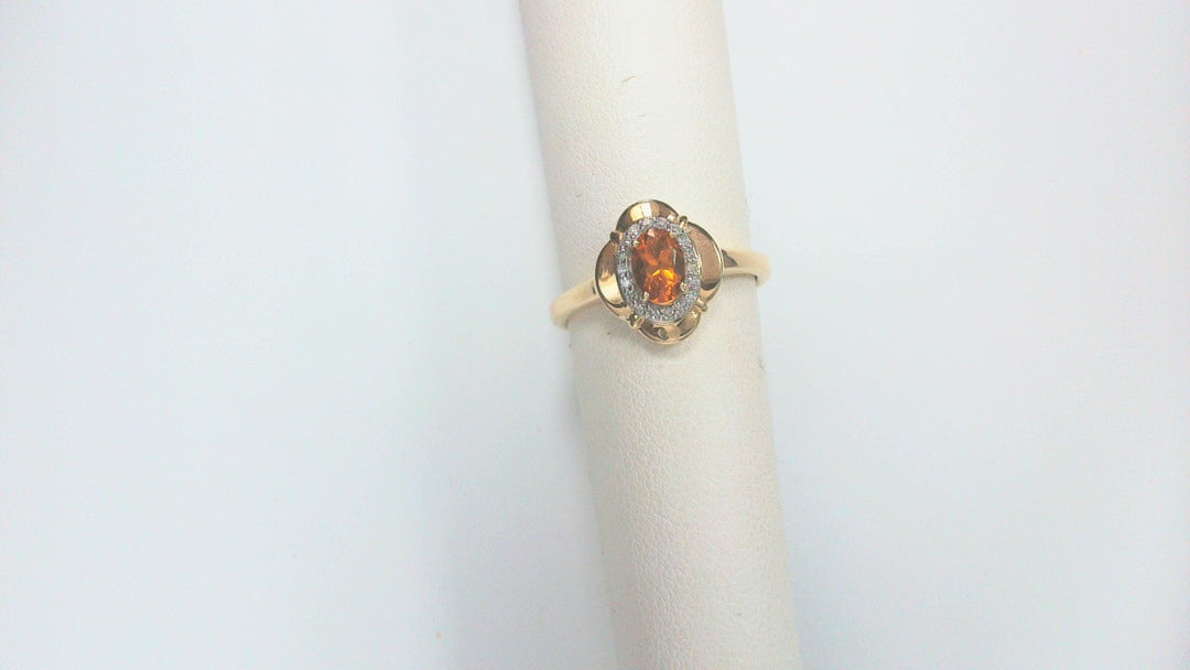 Precious Metal Gemstone Rings Under $4999