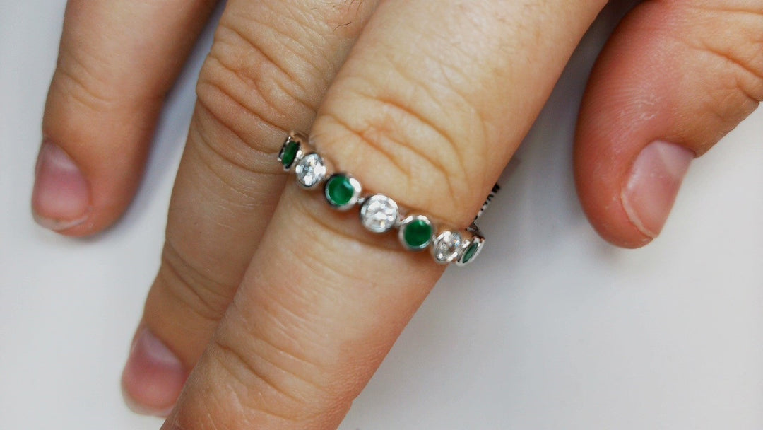 Precious Metal Gemstone Rings Under $4999