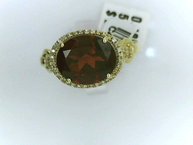Precious Metal Gemstone Rings Under $4999