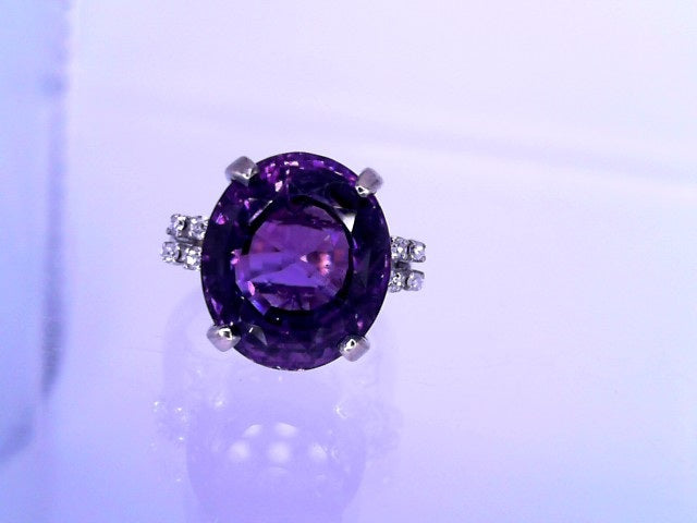 Precious Metal Gemstone Rings Under $4999