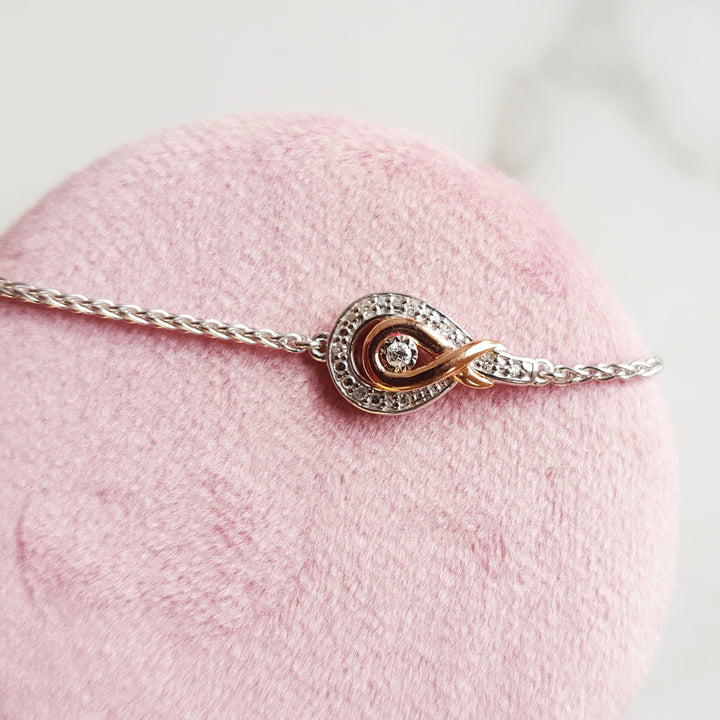 Gems One Diamond Twisted Love Knot Bolo Bracelet