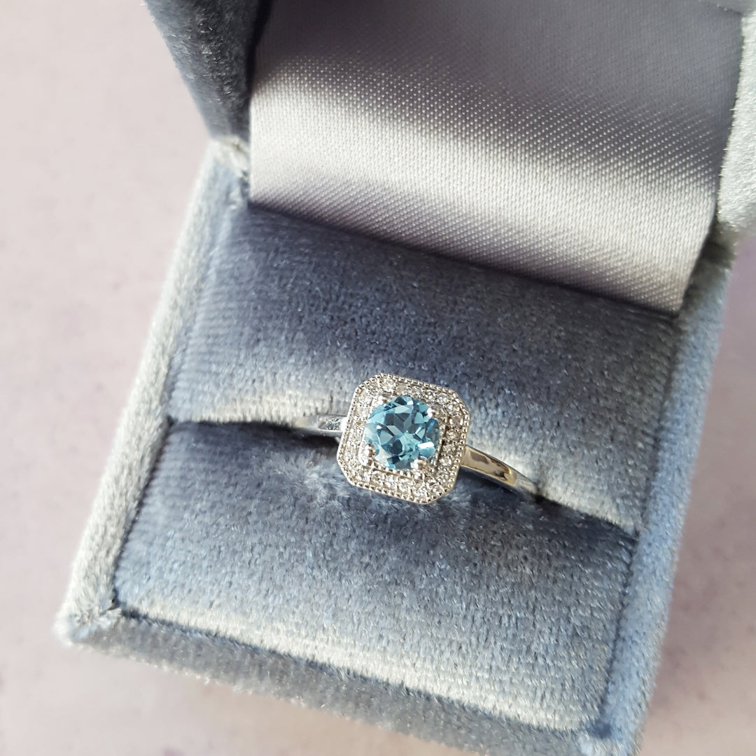 Double Halo Bleu Topaz Ring