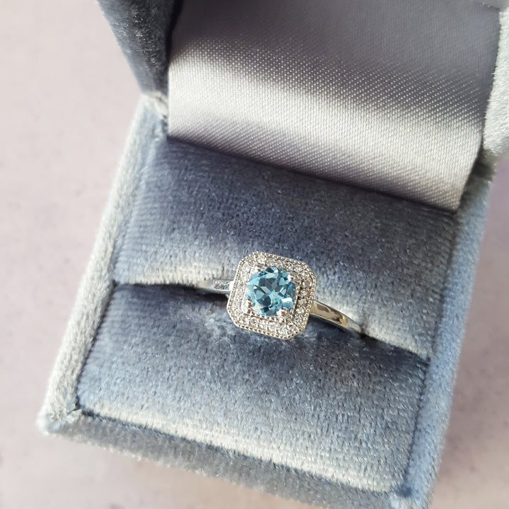 Double Halo Bleu Topaz Ring