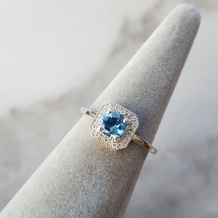 Double Halo Bleu Topaz Ring