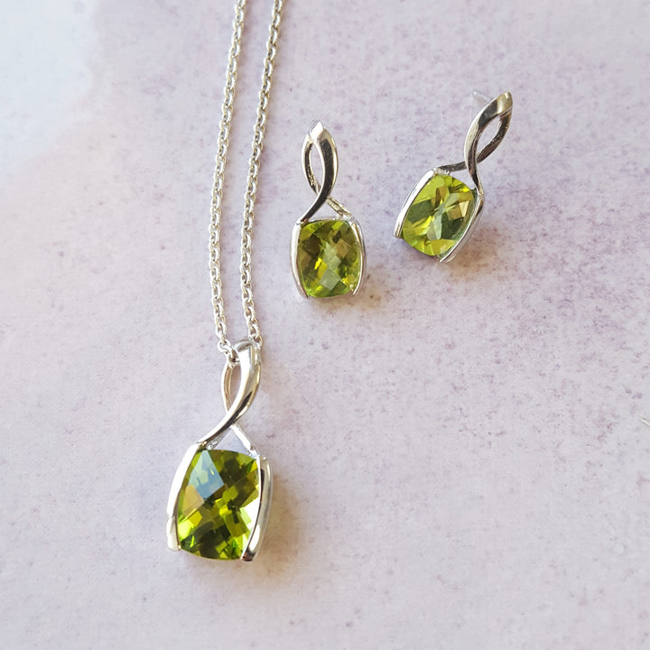 Elegant Swoop Peridot Studs