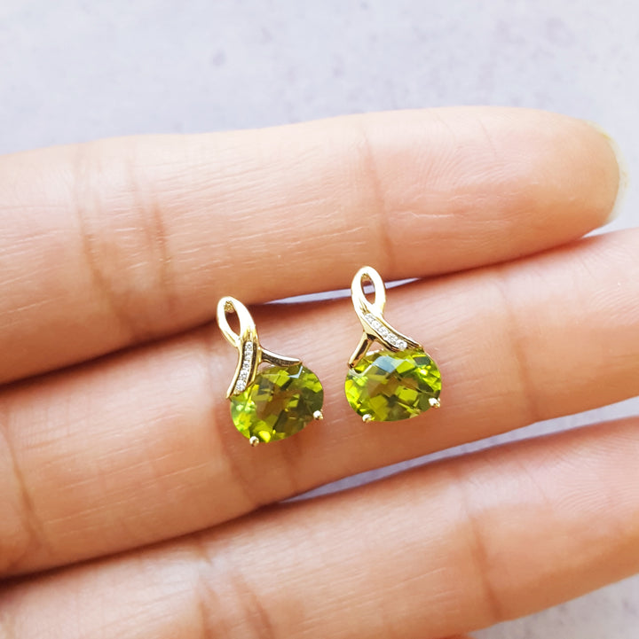 Elegant Swoop Peridot Studs