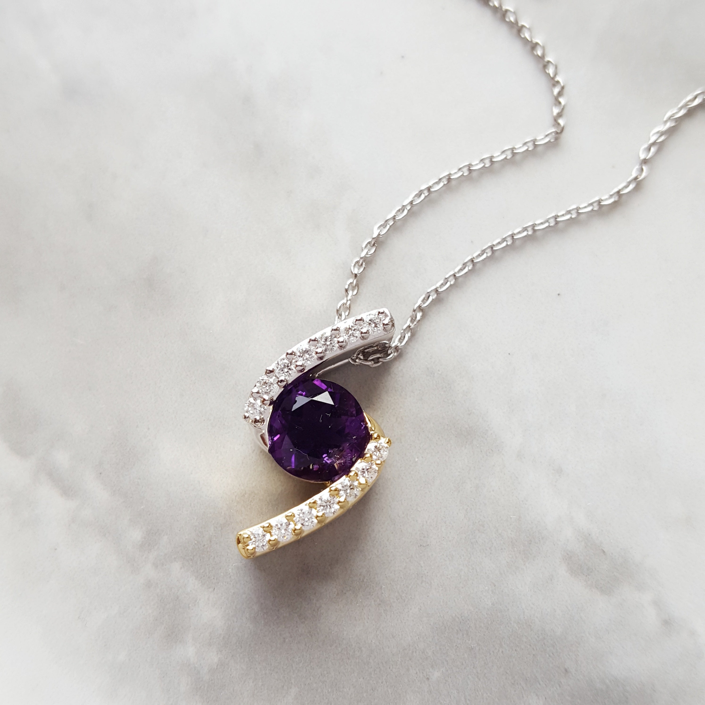 Bypassing Gold Amethyst Pendant