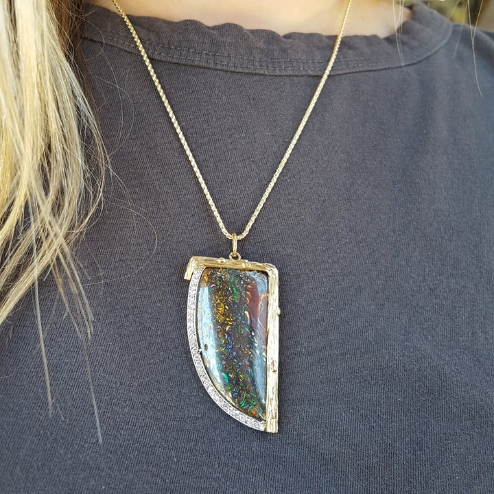 Luxury by Rene Hernandez Opal Saber Tooth Pendant