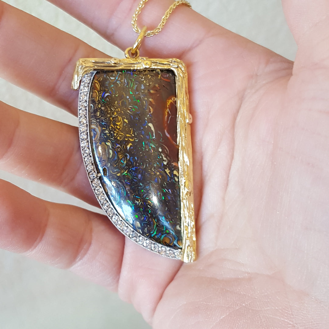 Luxury by Rene Hernandez Opal Saber Tooth Pendant