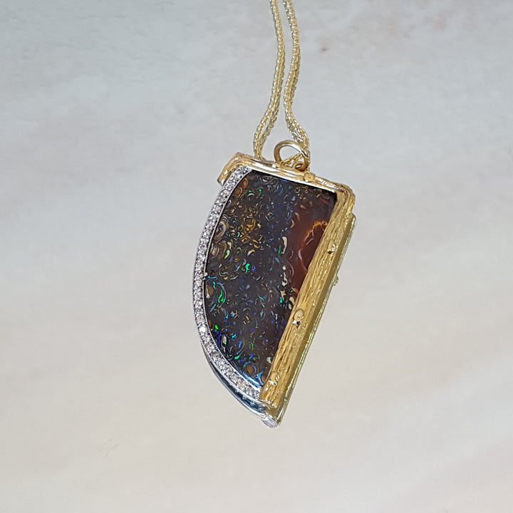 Luxury by Rene Hernandez Opal Saber Tooth Pendant