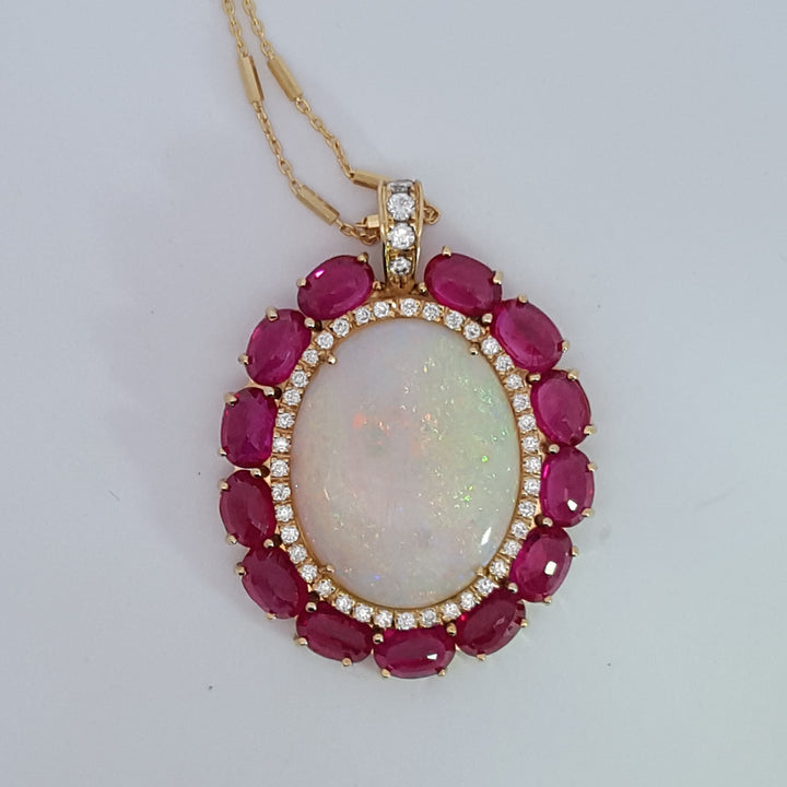 Luxury by Rene Hernandez Victorian Elegance Opal and Ruby Pendant