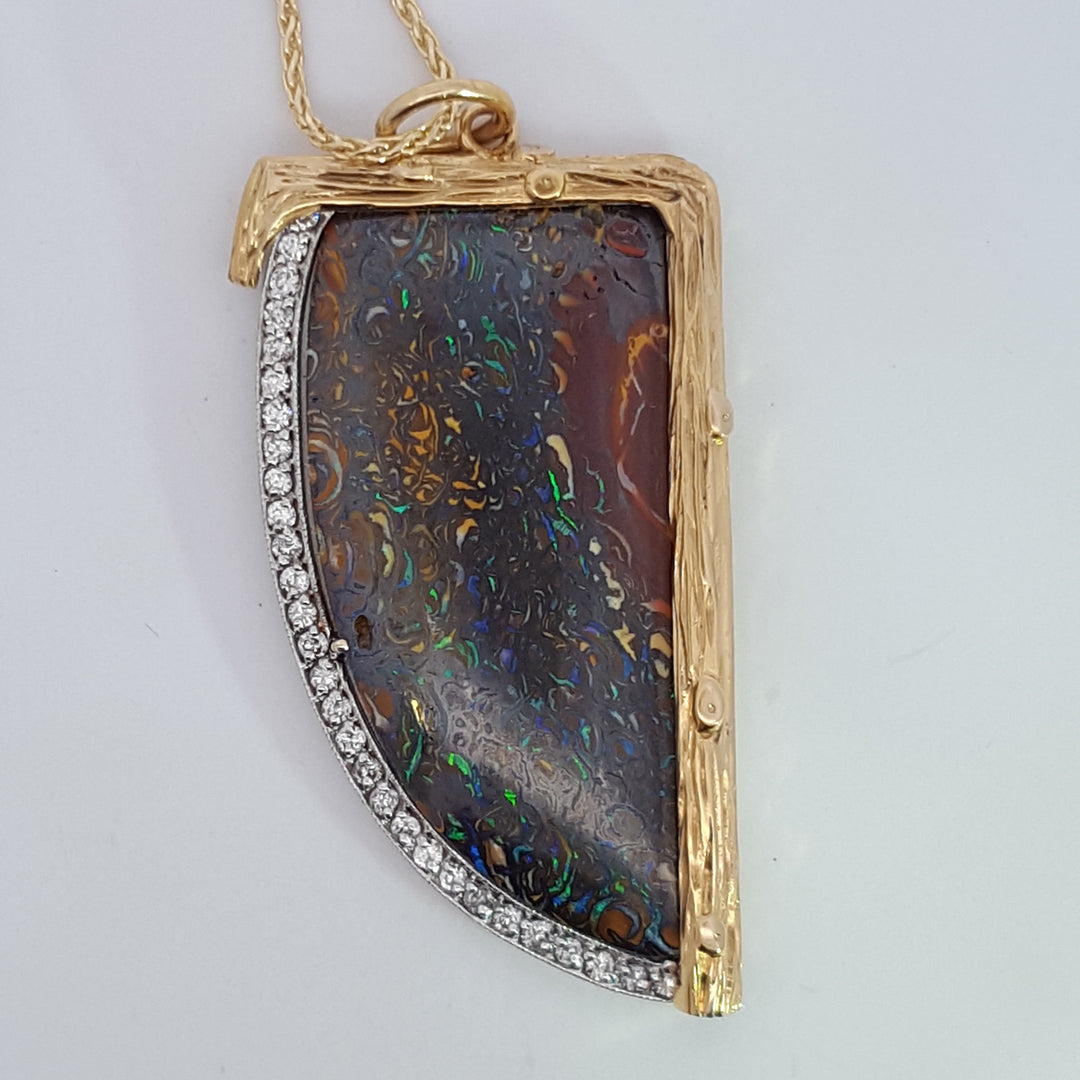 Luxury by Rene Hernandez Opal Saber Tooth Pendant