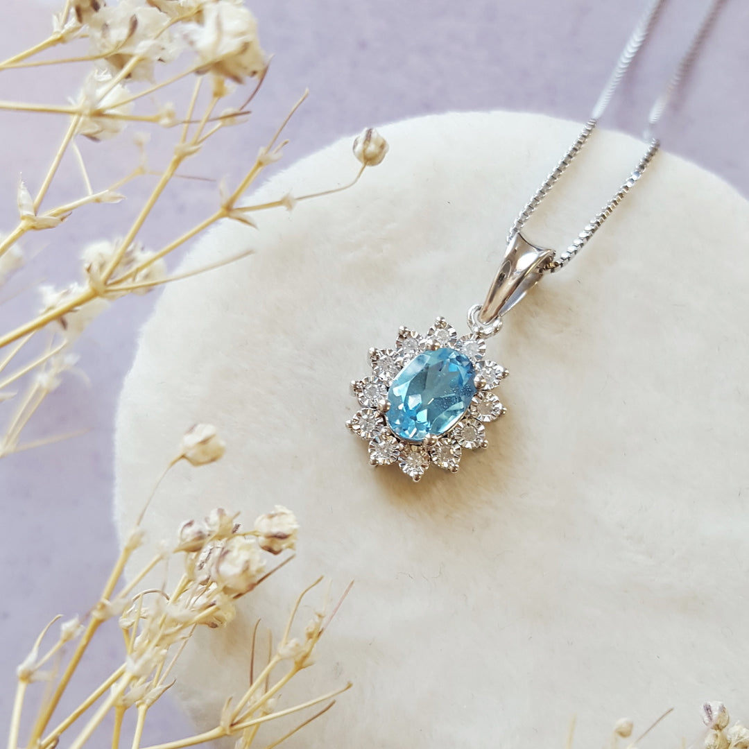 Sterling Silver Halo Blue Topaz Pendant
