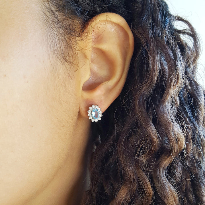 Sterling Silver Blue Topaz Halo Stud Earrings