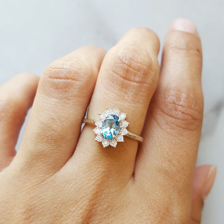 Sterling Silver Blue Topaz Halo Ring