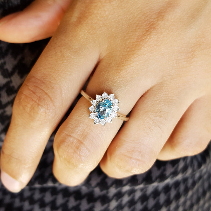Sterling Silver Blue Topaz Halo Ring