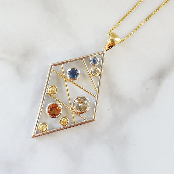 "Sapphire Matrix"; 14k Yellow Gold Montana Sapphire Pendant