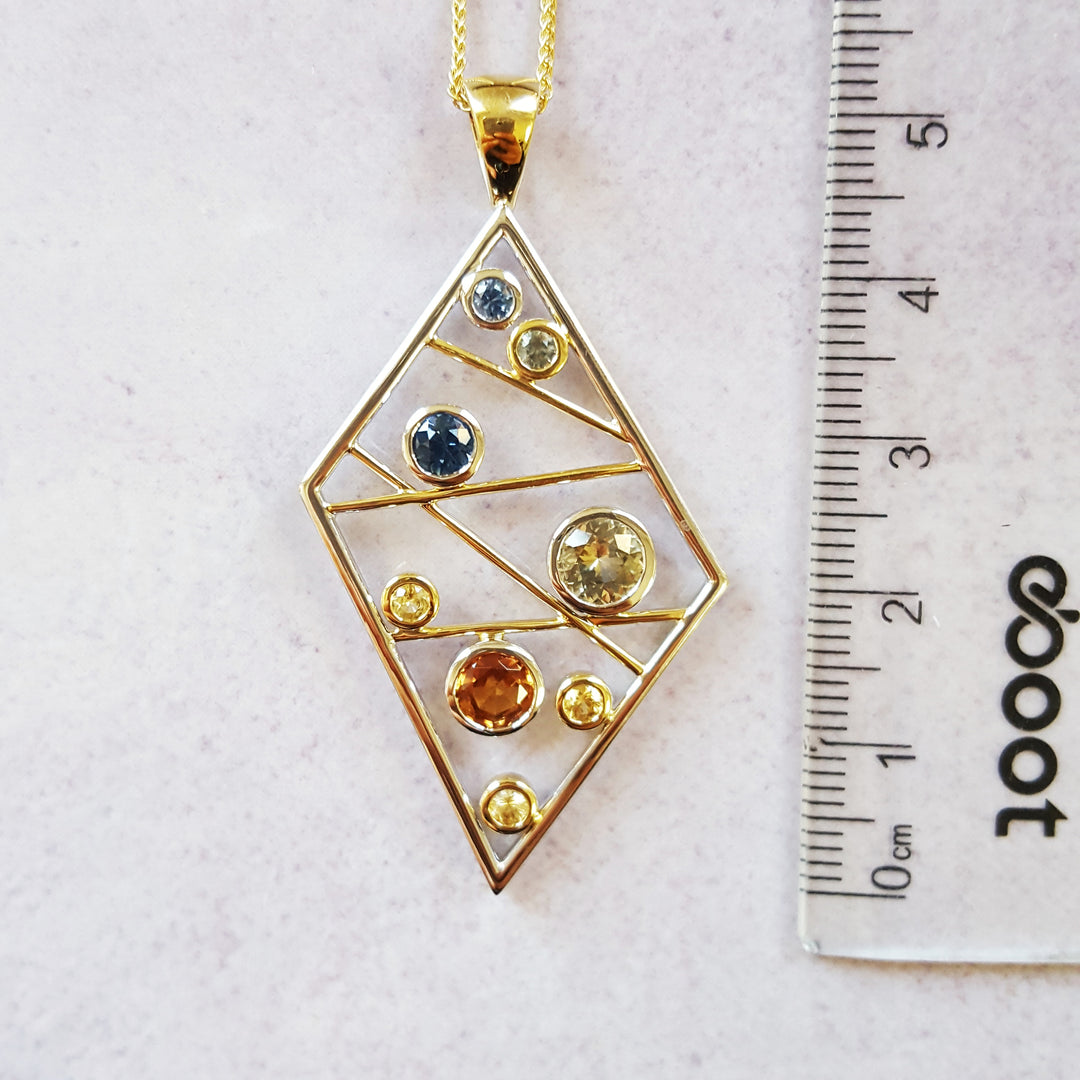 "Sapphire Matrix"; 14k Yellow Gold Montana Sapphire Pendant
