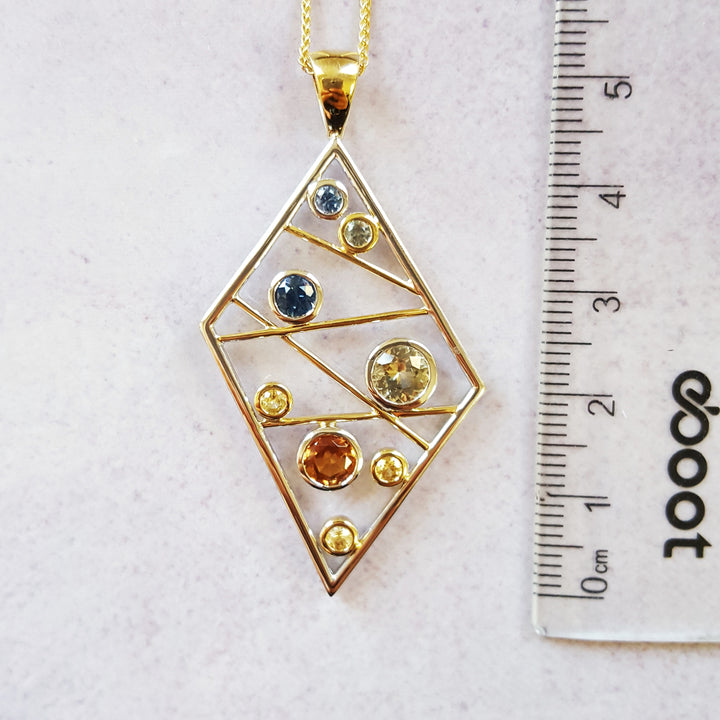 "Sapphire Matrix"; 14k Yellow Gold Montana Sapphire Pendant