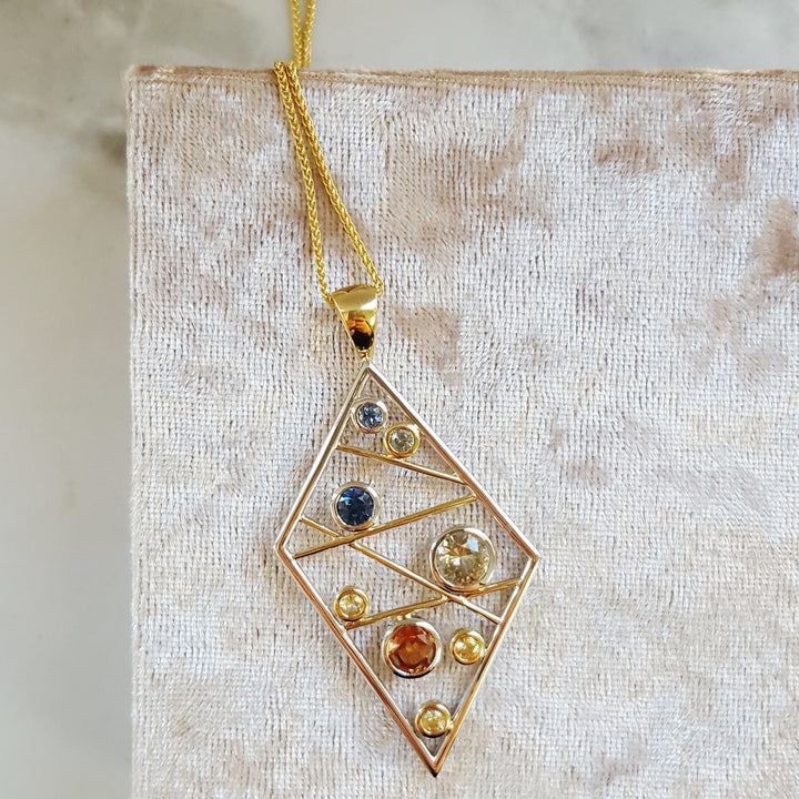 "Sapphire Matrix"; 14k Yellow Gold Montana Sapphire Pendant