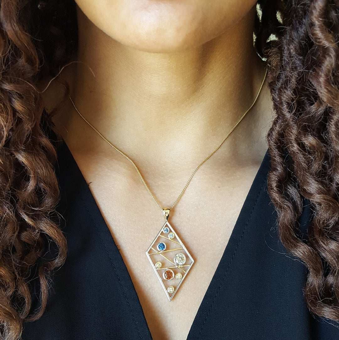 "Sapphire Matrix"; 14k Yellow Gold Montana Sapphire Pendant