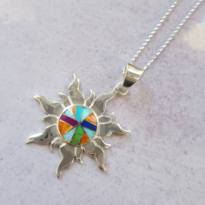 Arizona Turquoise and Inlaid Jewelry Multicolored Sun Pendant