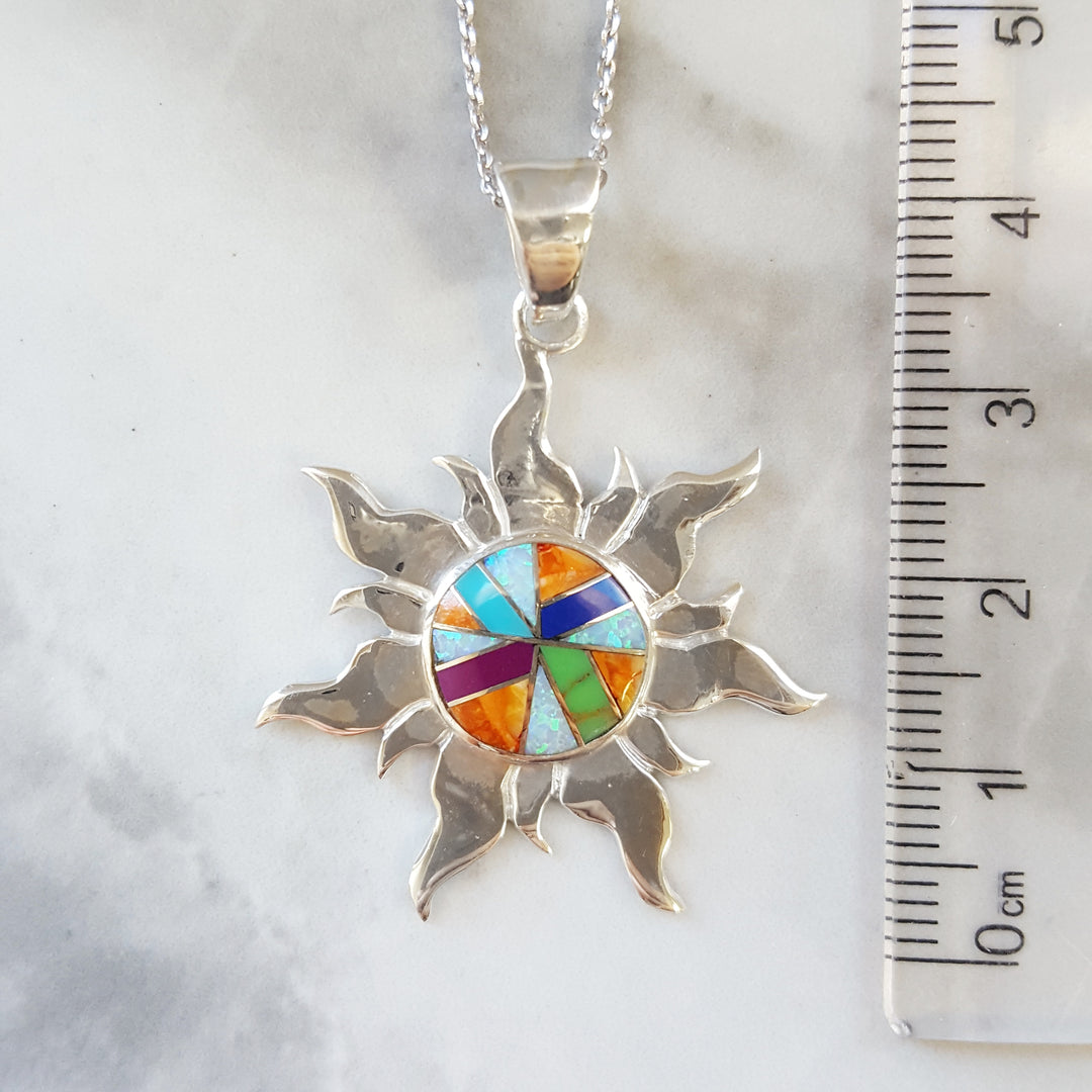 Arizona Turquoise and Inlaid Jewelry Multicolored Sun Pendant