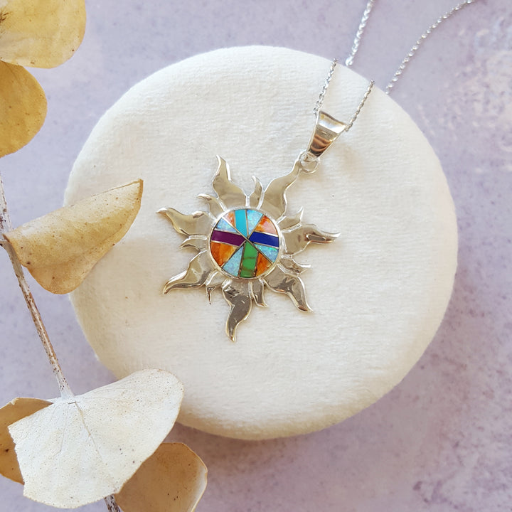 Arizona Turquoise and Inlaid Jewelry Multicolored Sun Pendant