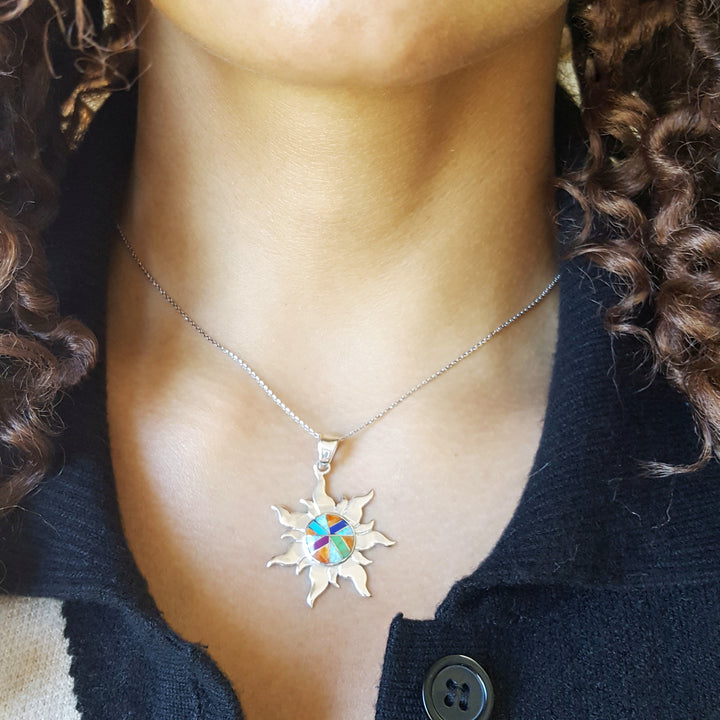 Arizona Turquoise and Inlaid Jewelry Multicolored Sun Pendant
