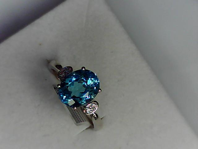 Precious Metal Gemstone Rings Under $4999