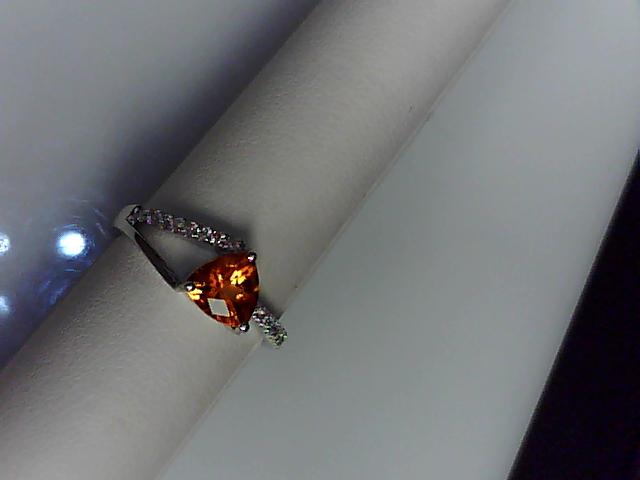 Precious Metal Gemstone Rings Under $4999