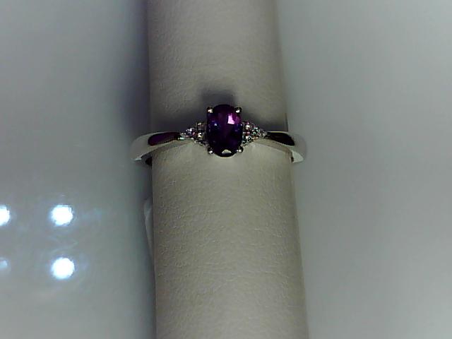 Precious Metal Gemstone Rings Under $4999