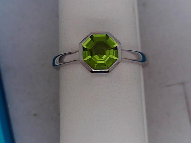 Precious Metal Gemstone Rings Under $4999