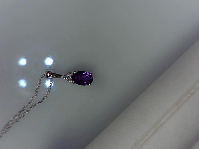 Precious Metal Gemstone Pendant