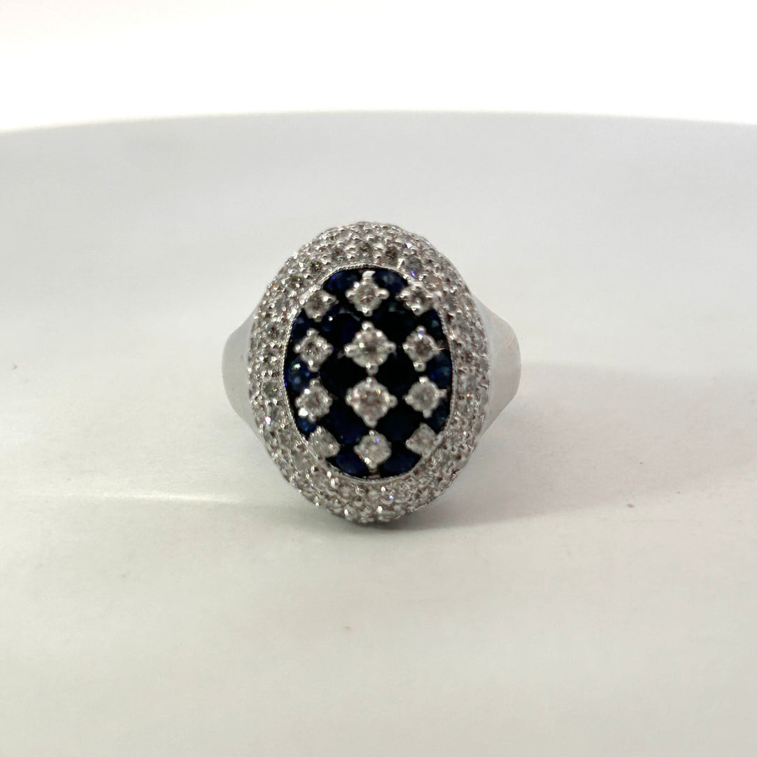 Precious Metal Gemstone Rings Over $5000
