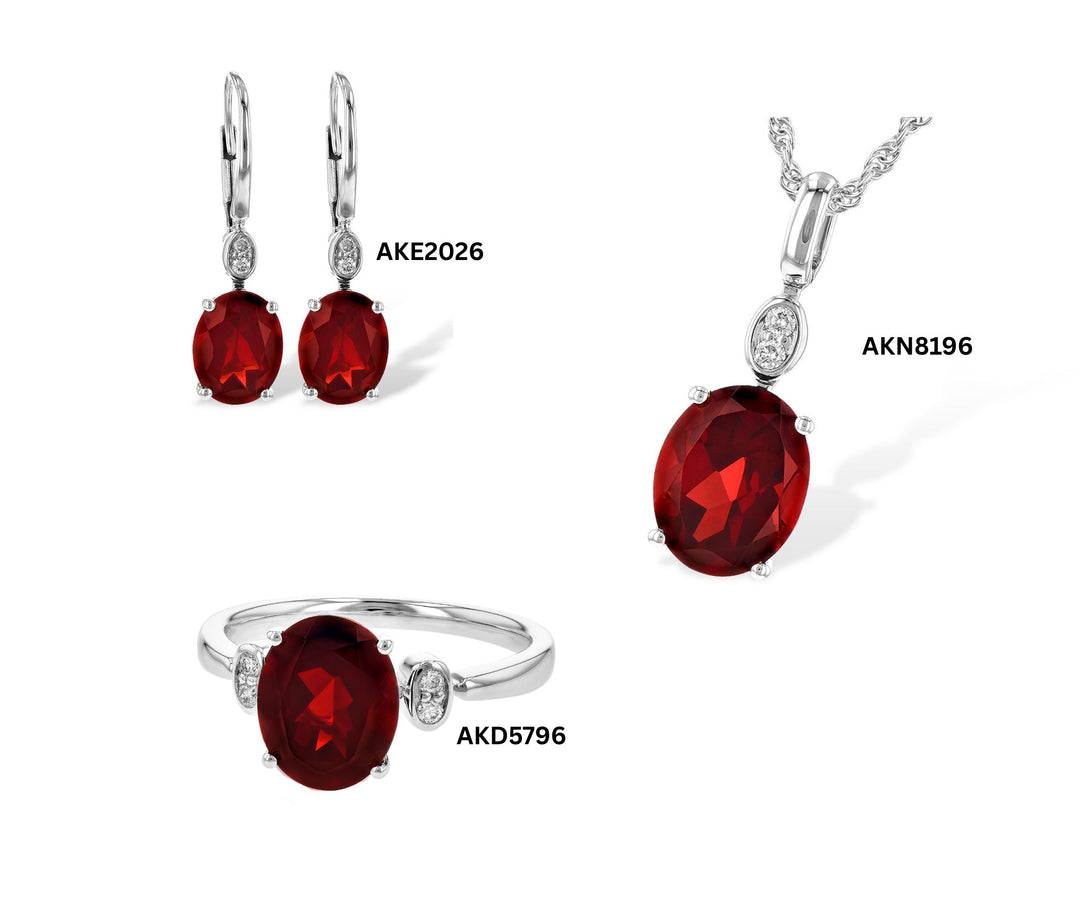 Oval Garnet & Diamond Ring in 14k Gold