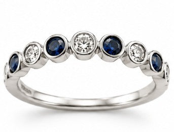 Precious Metal Gemstone Rings Under $4999