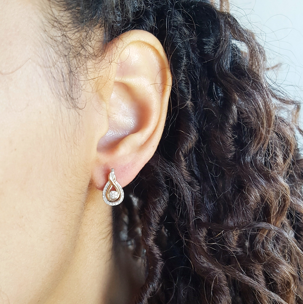 Sterling Silver and Rose Gold Swirling Diamond Studs