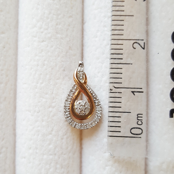 Sterling Silver and Rose Gold Swirling Diamond Studs