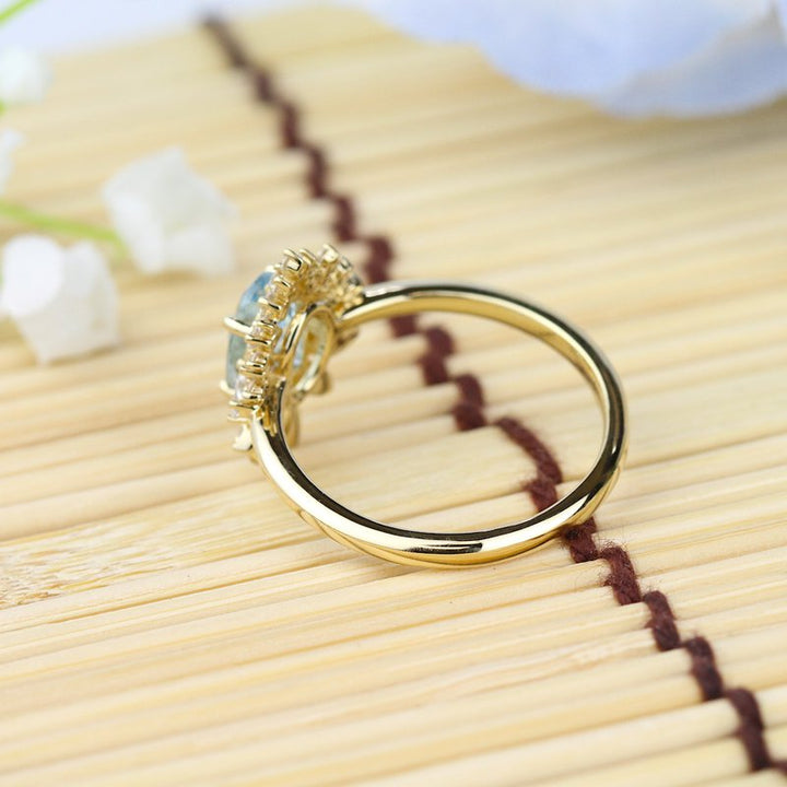 Parade Starburst Halo Aquamarine Ring