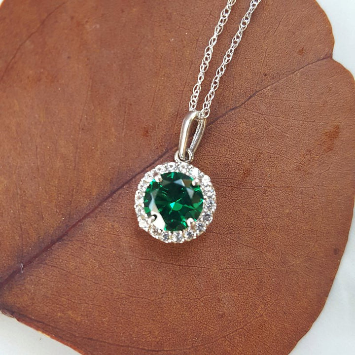 Sami Fine Jewelry Emerald Halo Birthstone Pendant