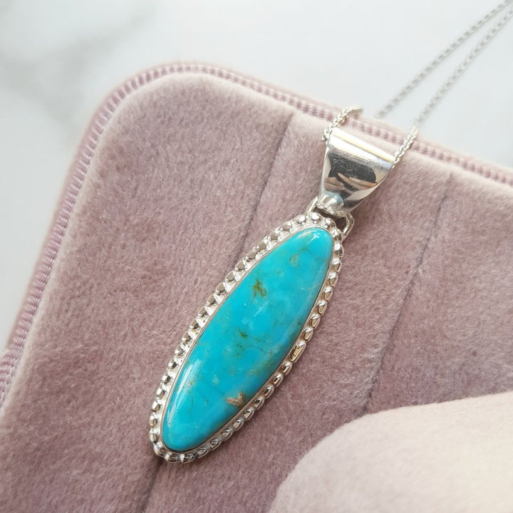 Arizona Turquoise and Inlaid Jewelry Long Oval Kingman Turquoise Pendant 2412690-KG