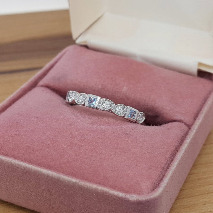 Gems One 14K White Gold Stackable Bezel Aquamarine Band (1/12 Ct. Tw.) FR1270-4WD