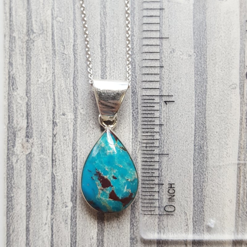 Arizona Turquoise and Inlaid Jewelry Teardrop Inlaid Turquoise Pendant