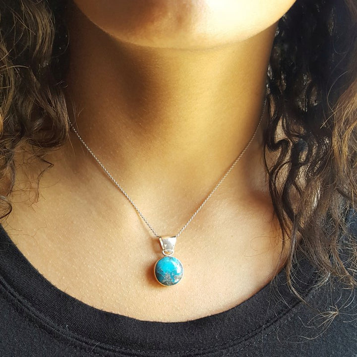 Arizona Turquoise and Inlaid Jewelry Round Arizona Turquoise Pendant