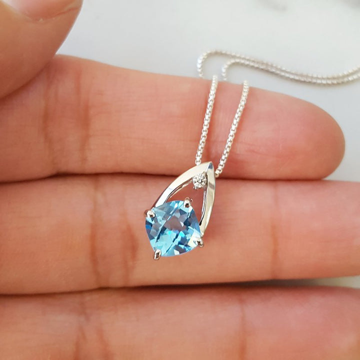 Sami Fine Jewelry Open Blue Topaz Pendant