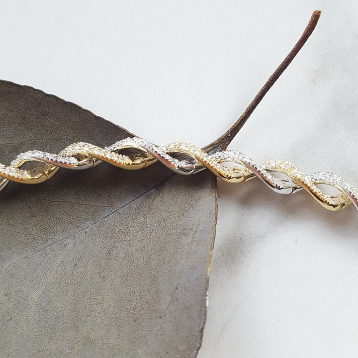 Gems One Two Tone Twist Bracelet BC10275