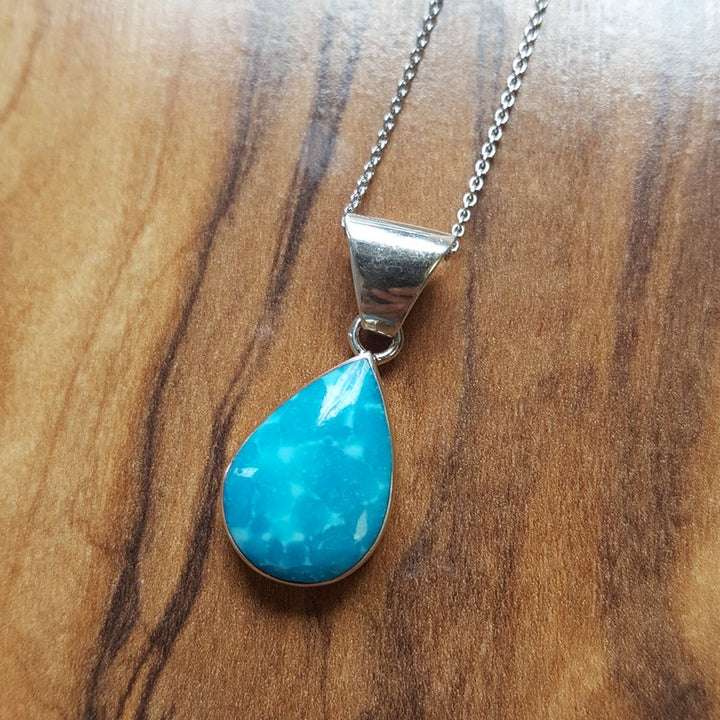 Arizona Turquoise and Inlaid Jewelry Teardrop Inlaid Turquoise Pendant