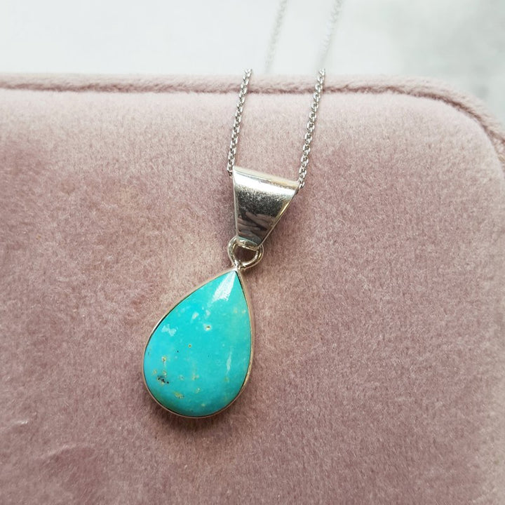 Arizona Turquoise and Inlaid Jewelry Teardrop Inlaid Turquoise Pendant